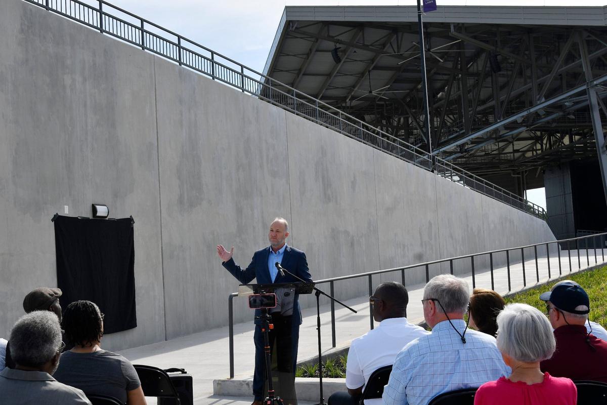 Macon-Bibb mayor Lester Miller speaks to the crowd at the plague unveiling of the Atrium Health Amphitheater on Friday, May 31, 2024, in Macon, Georgia. The 12,000 seat Atrium Health Amphitheater opened in March and will host a number of events in the upcoming months.