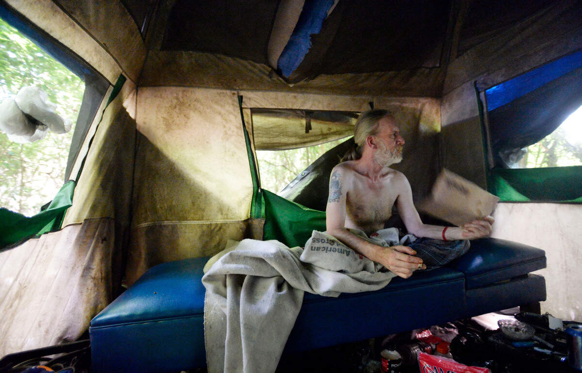 Bill Shaw, a veteran who makes his home in a tent near Riverside Drive, says he barely survives the hot Georgia summers. But, on July 9, he said fanning himself with a small piece of cardboard was about as good as it gets. “It’s been pretty good the last couple of days,” he said as the temperatures barely broke into the 90s.