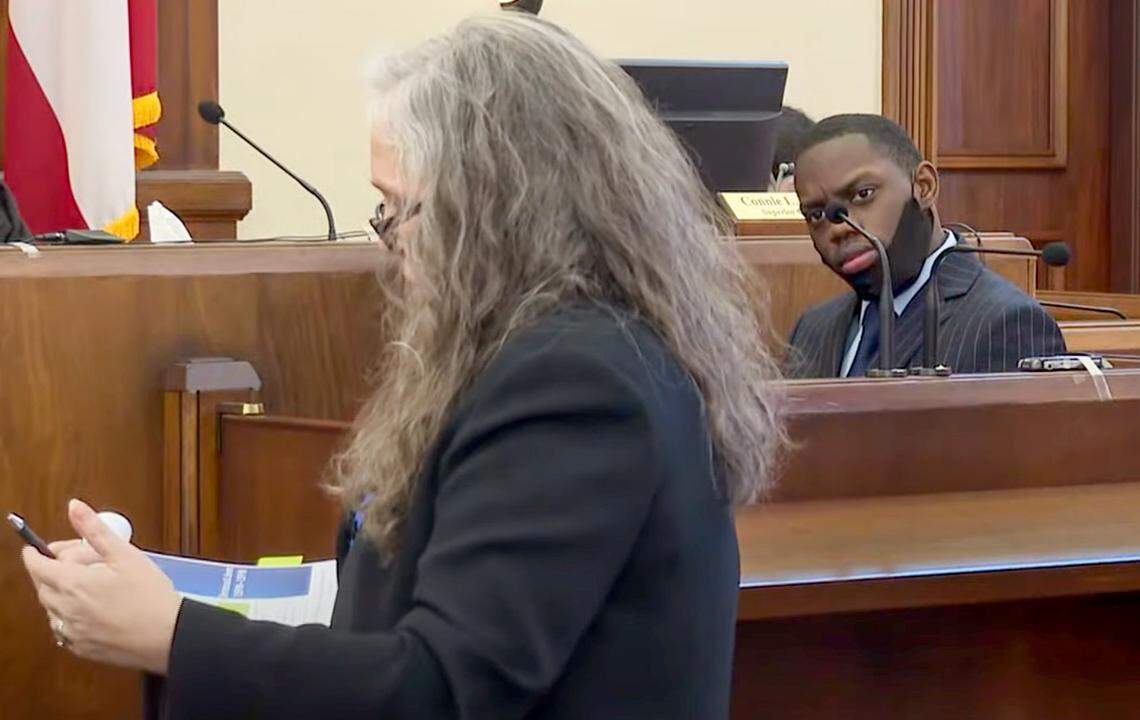 Assistant district attorney Dawn Baskin questioning Demarcus Little during Little’s trial Tuesday in a Peach County courtroom.