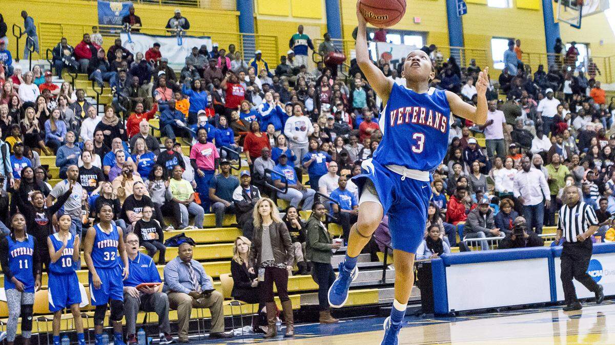 After stealing the ball, Veterans' Kya Cochran (3) scores on a layup against Wayne County in the GHSA Class AAAA semifinals.