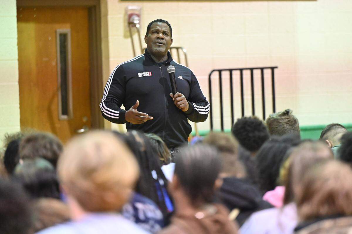Reclaiming Ground Inc. president Willie Raines (right) speaks to Byron Middle School eighth grade students for an annual anti-bullying assembly in the gymnasium on Thursday, April 9, 2026, in Byron, Georgia. Byron Middle School hosted Raines’ Combat Bullying Tour which stressed suicide prevention and anti-bullying. 