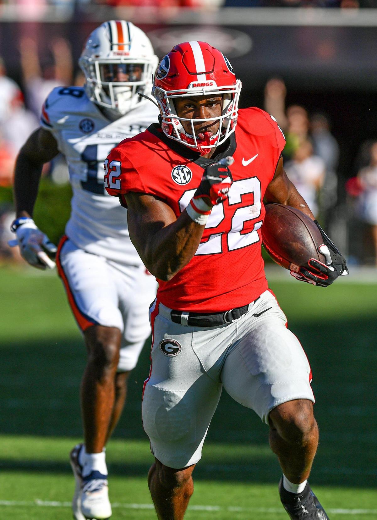 Georgia running back Branson Robinson heads for a first down against Auburn Saturday in Athens. Georgia beat Auburn 42-10.