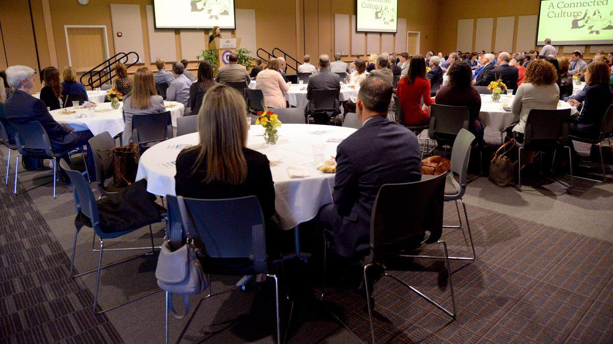 Aynn Collins, director of employee experience at Mailchimp, speaks at the Greater Macon Chamber of Commerce’s 2019 Business and Industry Award luncheon on Tuesday.
