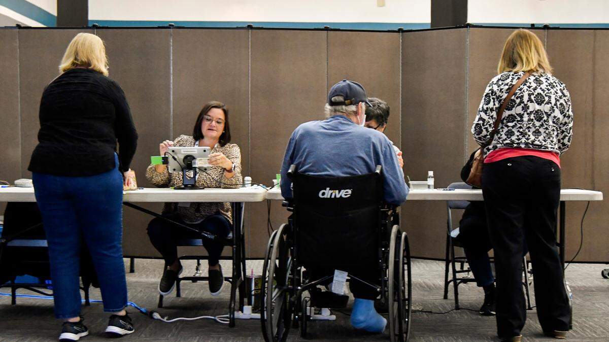 Voters sign in at Second Baptist Church in this Telegraph file photo. Polls are open from 7 a.m. to 7 p.m.