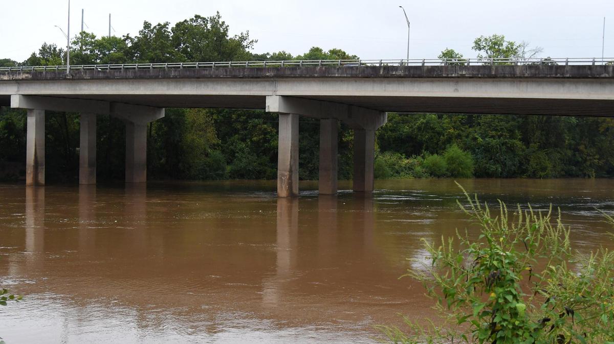 The Ocmulgee River flows underneath Gray Highway on Thursday, Sept. 26, 2024, in Macon, Georgia. Macon and Milledgeville received a $1.5 million EPA grant last spring to to conduct environmental site assessments and will target areas of East Macon, including from the Ocmulgee River up Gray Highway.