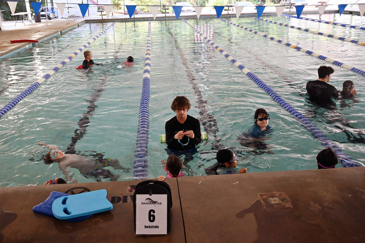 Instructors lead swimmers at different stations at Fusion Swim Team swim lessons on Tuesday, July 7, 2026, at the Northside Pool in Macon, Ga. Fusion Swim Team began its Swim America curriculum swim lessons last summer for swimmers 15 and under.