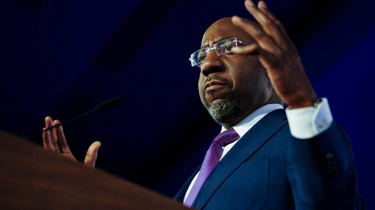 Democratic Sen. Raphael Warnock speaks during an election night watch party, Tuesday, Dec. 6, 2022, in Atlanta. Democratic Sen. Raphael Warnock has defeated Republican challenger Herschel Walker in a runoff election in Georgia. (AP Photo/John Bazemore)