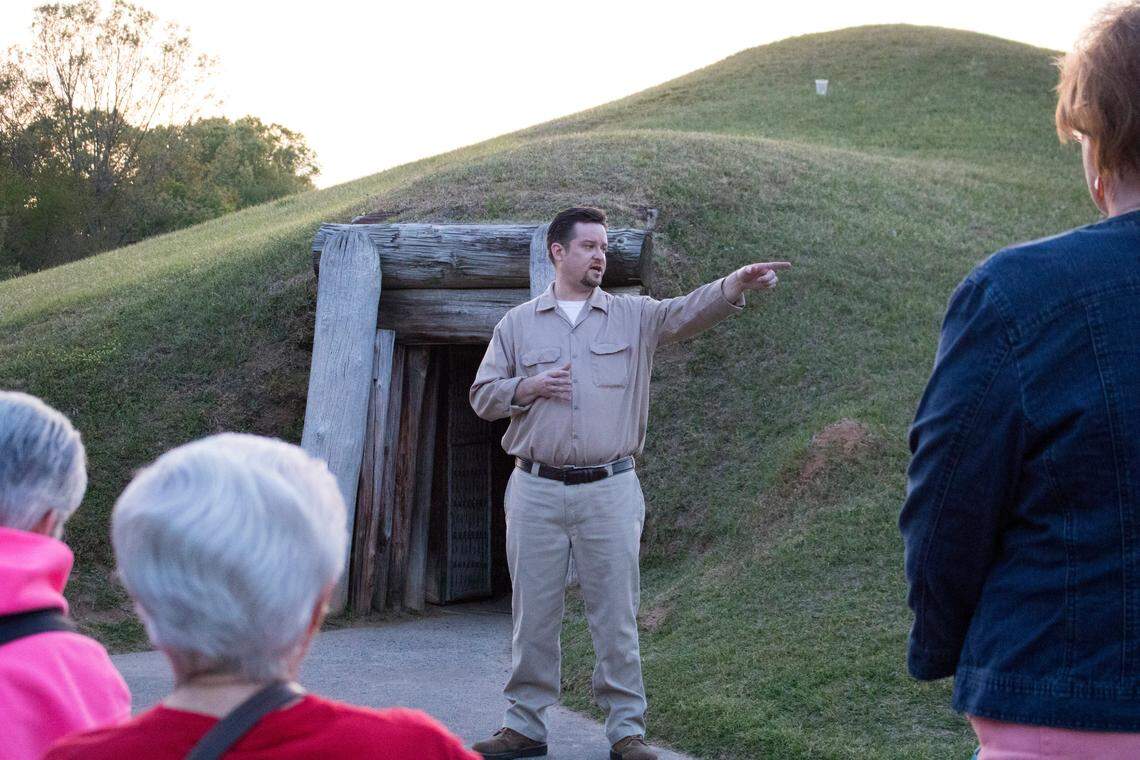 FILE: Jeremy Carroll plays the role of a Civilian Conservation Corps worker on the Lantern Light Tour at the Ocmulgee Mounds National Historical Park. Marianna Bacallao/Center for Collaborative Journalism