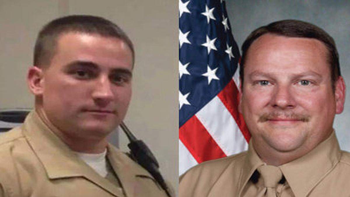 Monroe deputies Michael Norris, left, and Jeff Wilson.