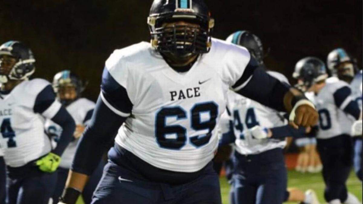 Pace Academy offensive lineman Jamaree Salyer signed with Georgia Wednesday.