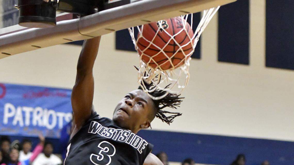 ‘What a game, man.’ Westside basketball hangs on to knock off Central in overtime.