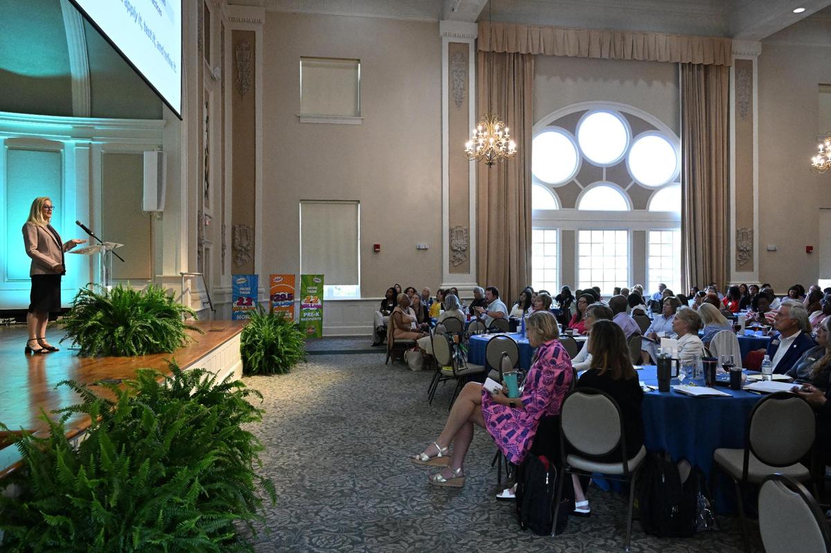 Keynote speaker Dr. Paige C. Pullen of Pullen Education Strategies (left) gives a presentation at the Governor’s Summit on Early Language and Literacy on Tuesday, July 8, 2025, inside of the Magnolia Ballroom at Georgia College and State University in Milledgeville, Georgia. The Deal Center hosted the annual summit for educators, researchers and policymakers to highlight current research related to literacy development.