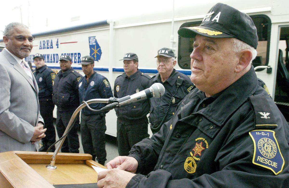 Johnny Wingers, pictured here in 2005, during the unveiling of a mobile command center for the Macon-Bibb County Emergency Management Agency.