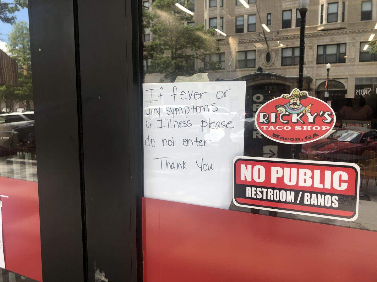 Sign on the door at Ricky’s Taco Shop on Cherry Street in downtown Macon.