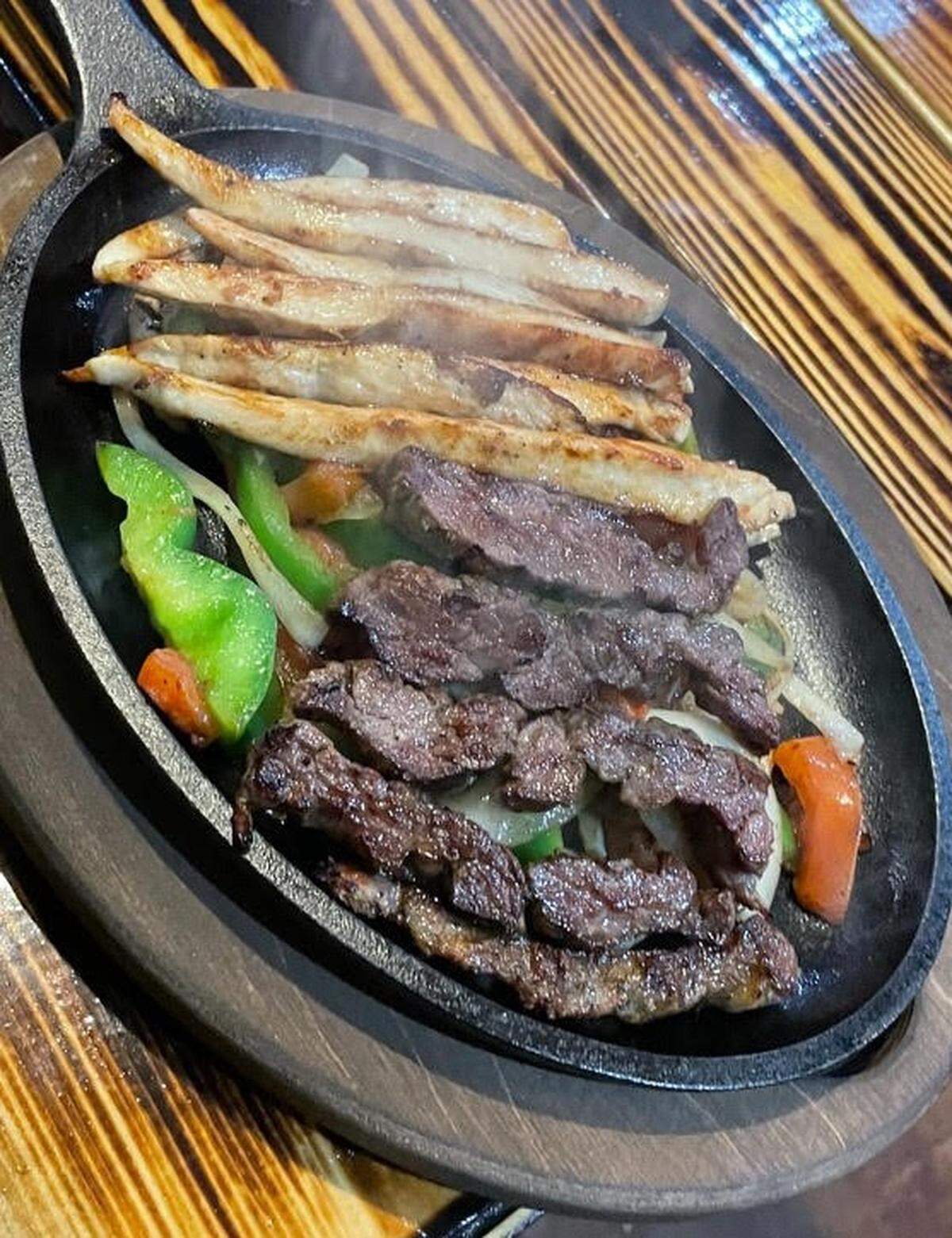 Grilled chicken and steak fajitas at Medina’s Mexican Grill at 1281 South Houston Lake Road in Warner Robins. The photo has been cropped.