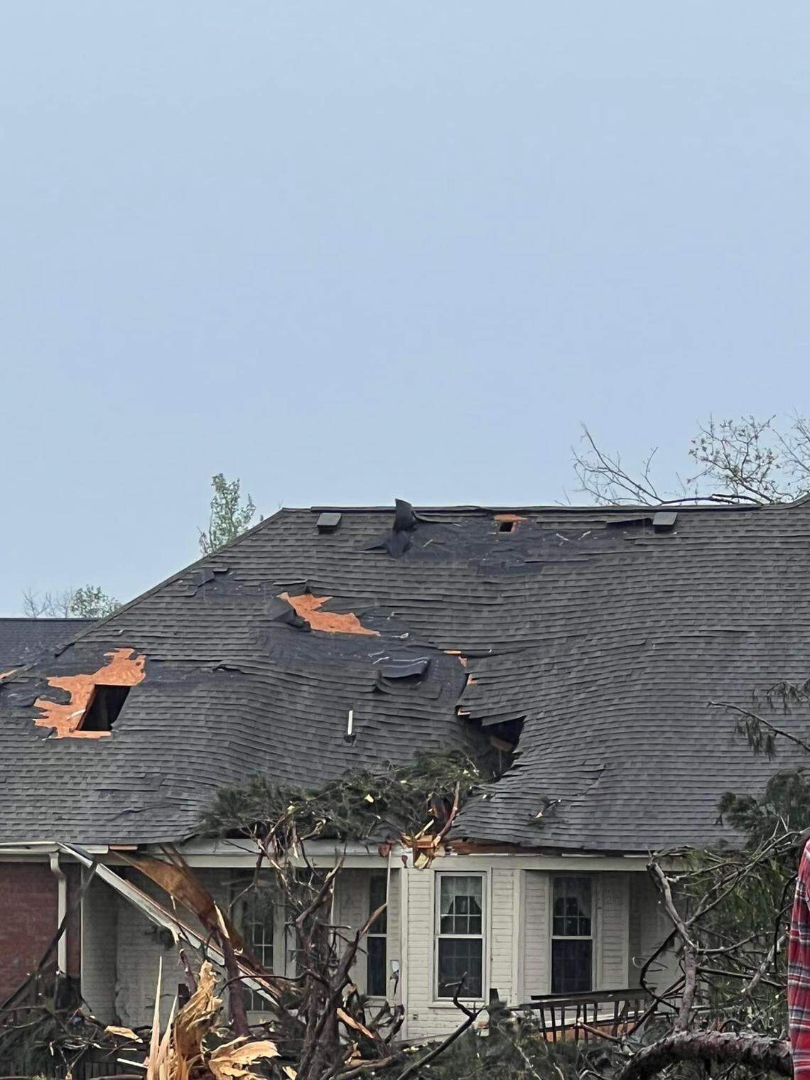 A severe storm system moved through Middle Georgia Tuesday afternoon, damaging houses and power lines, including this Stathams Landing House in Houston County.