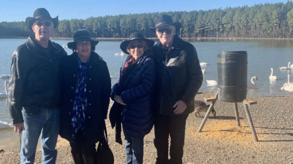 The trumpeter swans return to Arkansas every year. So do the Macon Swanns.