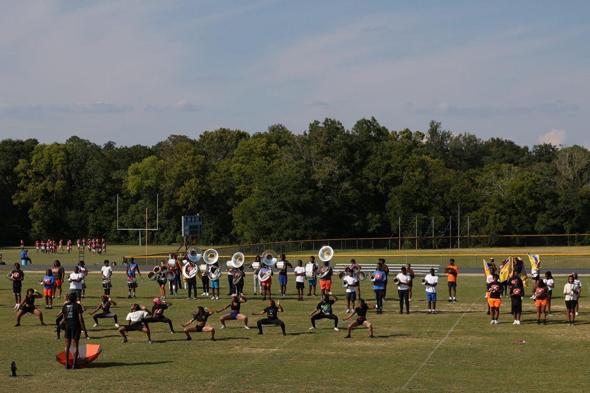 Members of the Central High School Marching Sugarbear Band and Sugarettes practice outdoors on Monday, Aug. 12, 2024, in Macon, Georgia. The Sugarbear Band won the Telegraph’s Best Marching Band in Middle Georgia poll.