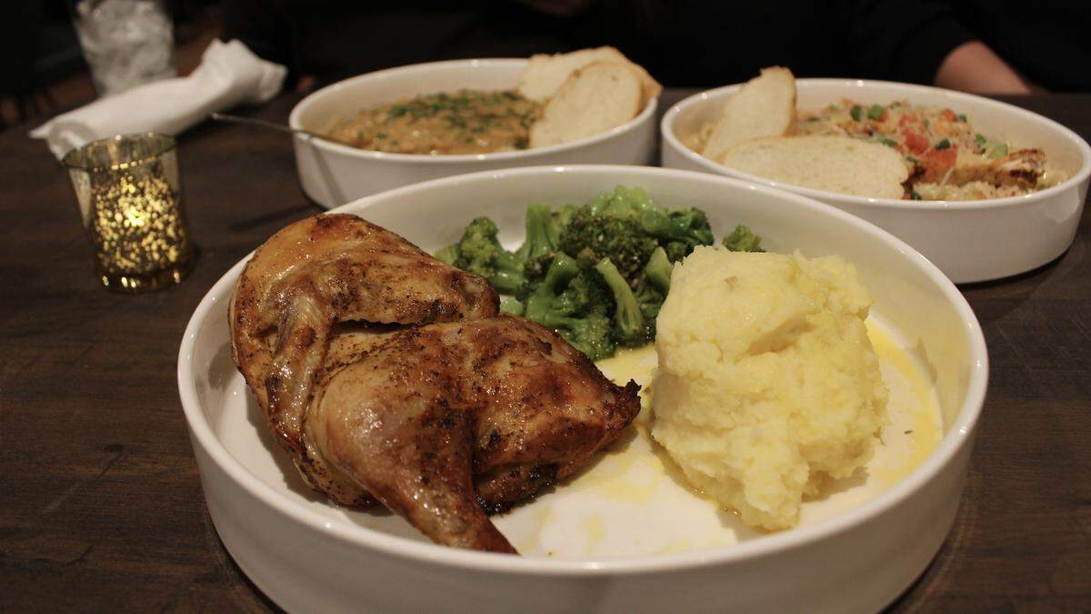 A half-roasted chicken (center) and shrimp tasso (left) are two of many new items at Parish on Cherry, 580 Cherry St. in Macon, Georgia. The Cajun pasta (right) is a fan favorite that stayed on the menu.