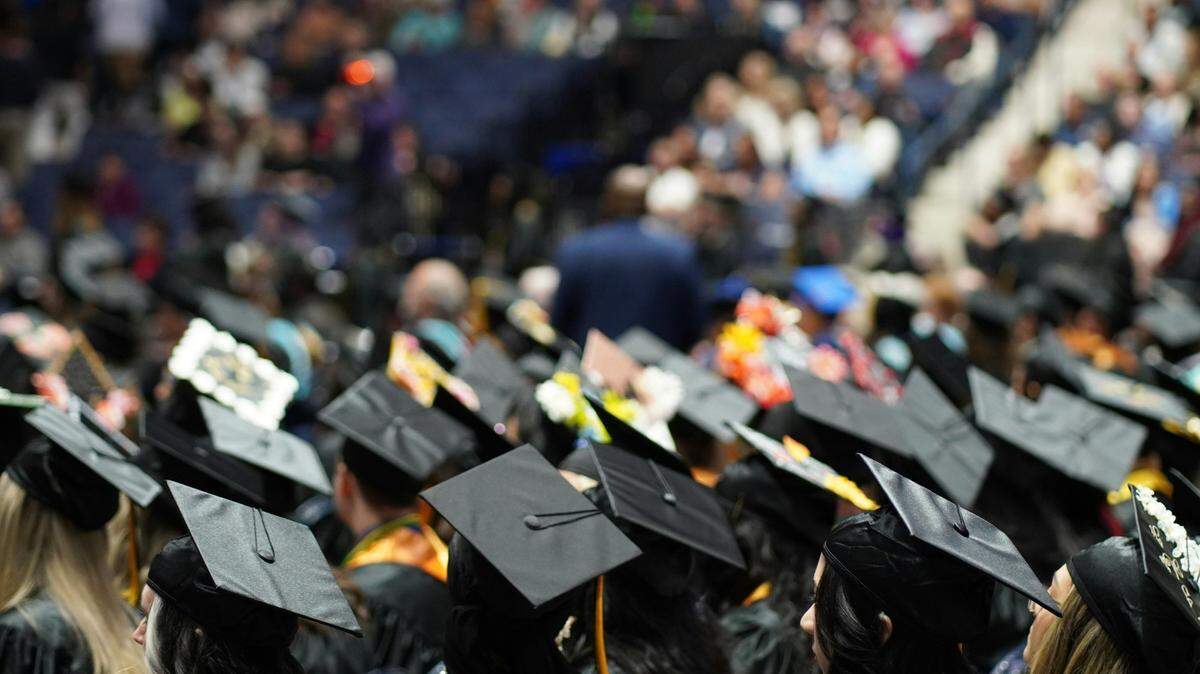 Black Cap and Gown Graduation