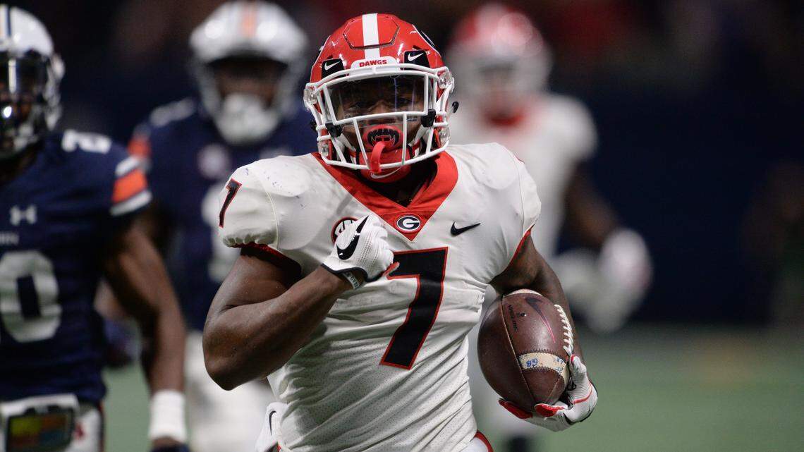 D'Andre Swift runs for a 64-yard touchdown against Auburn in the SEC Championship.
