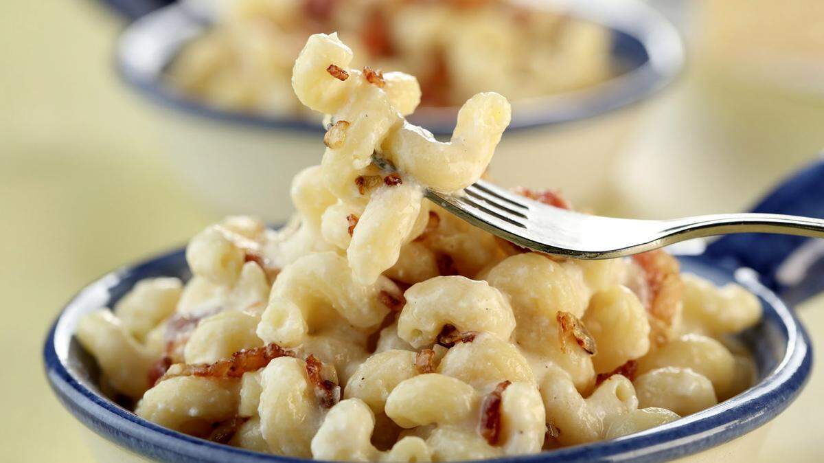 Bacon brings its smoky flavor to an easy stovetop mac and cheese. A trio of Parmesan, mascarpone and ricotta make up the sauce.