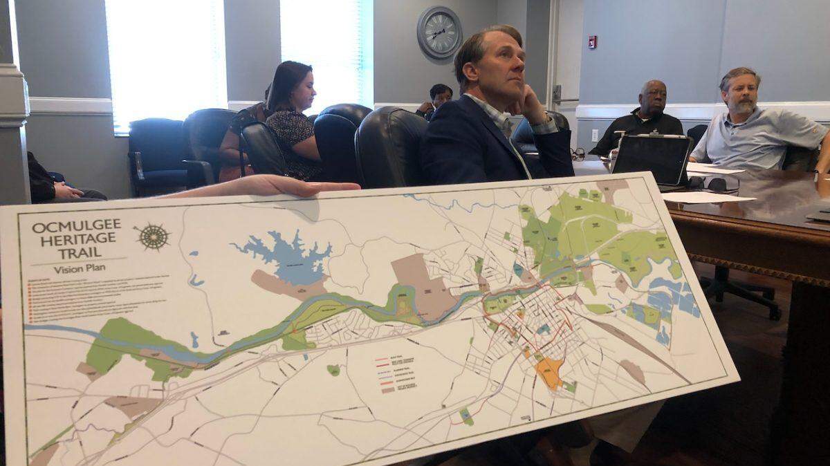 The Macon-Bibb County Urban Development Authority looks at plans for an expansion of the Ocmulgee Heritage Trail during a work session.