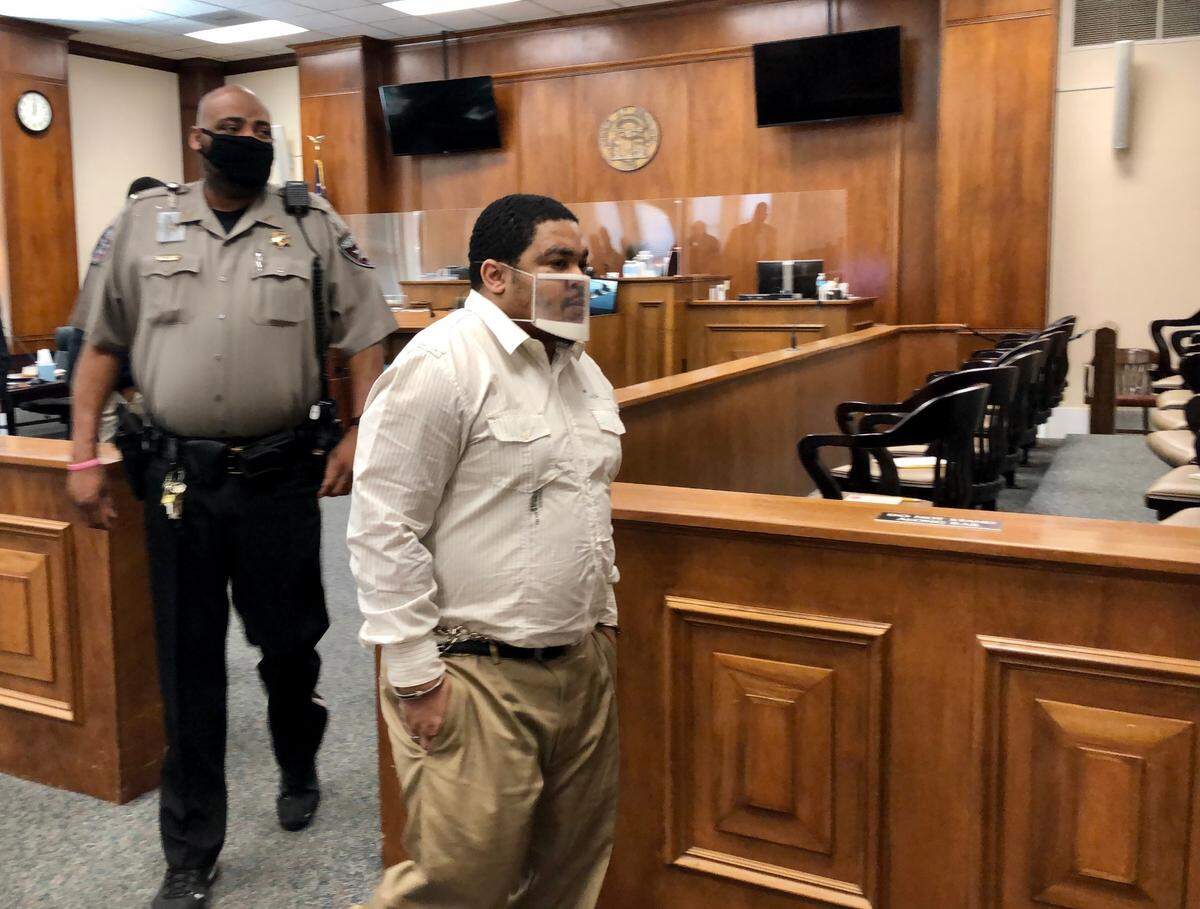 Rashad M. Mays leaving court during a midday break on Wednesday during his murder trial in the May 6, 2018, shooting death of Tavares Lester.