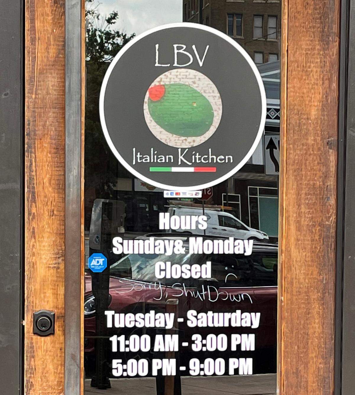 A note written on the door at La Bella Vita Italian Kitchen at 347 Cotton Ave. in downtown Macon announces that they are closed.