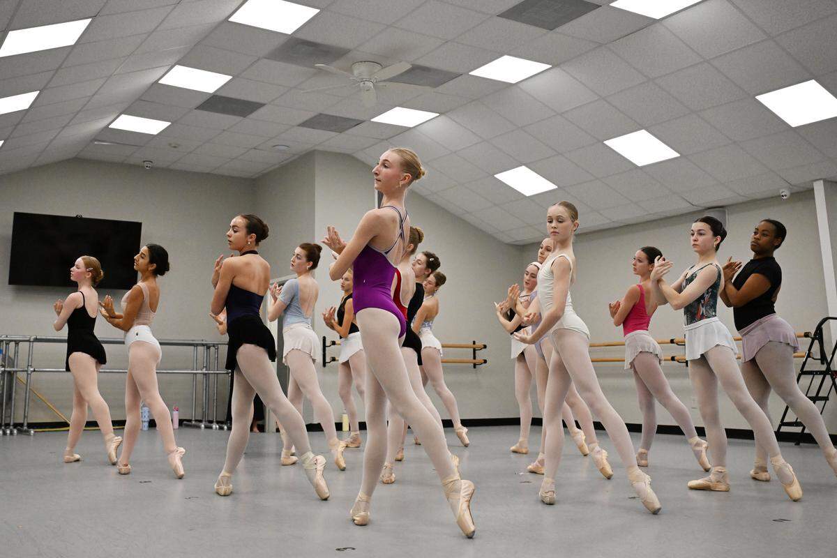 Nutcracker of Middle Georgia dancers rehearse the snow scene on Sunday, Nov. 23, 2025, at their studio in Macon, Georgia. The community production of “The Nutcracker” celebrates its 40th anniversary this year. 