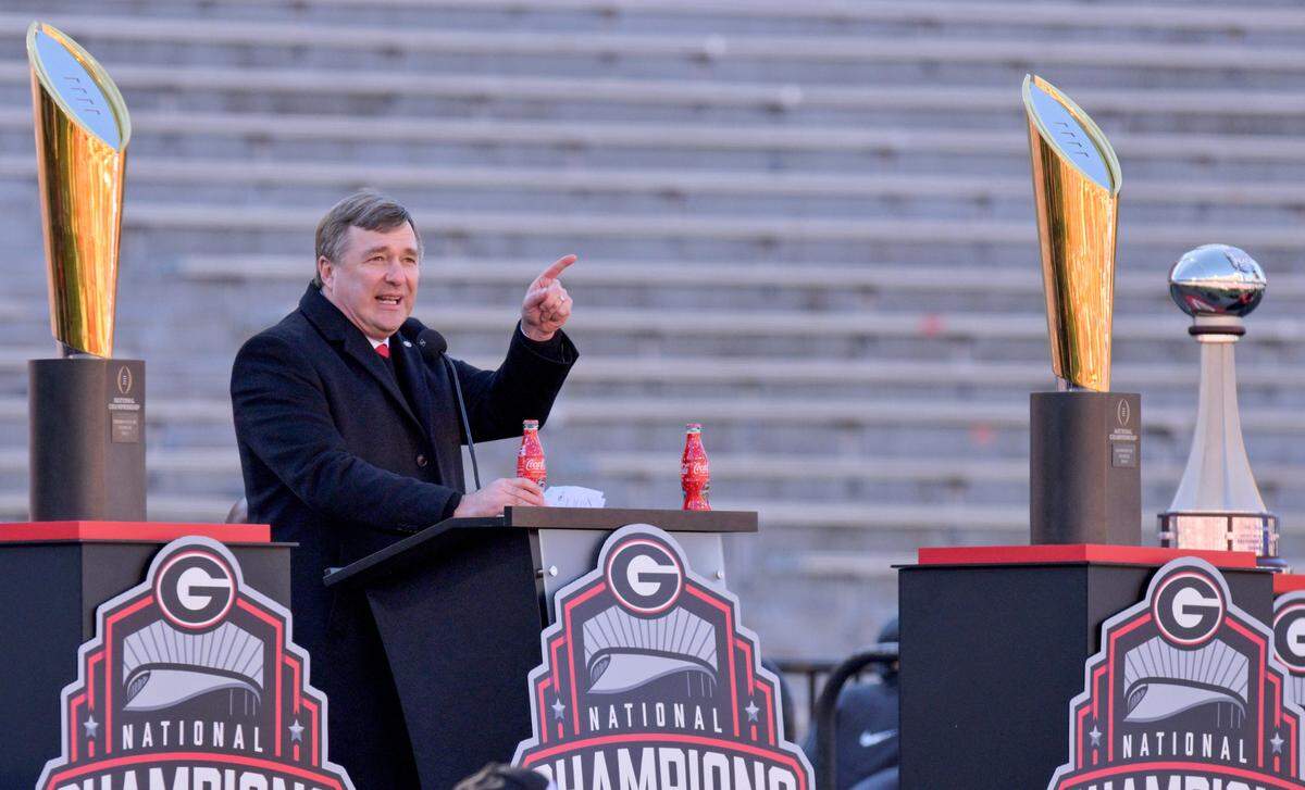 Georgia head coach Kirby Smart speaks to the crowd inside Sanford Stadium during Saturday’s celebration in Athens.