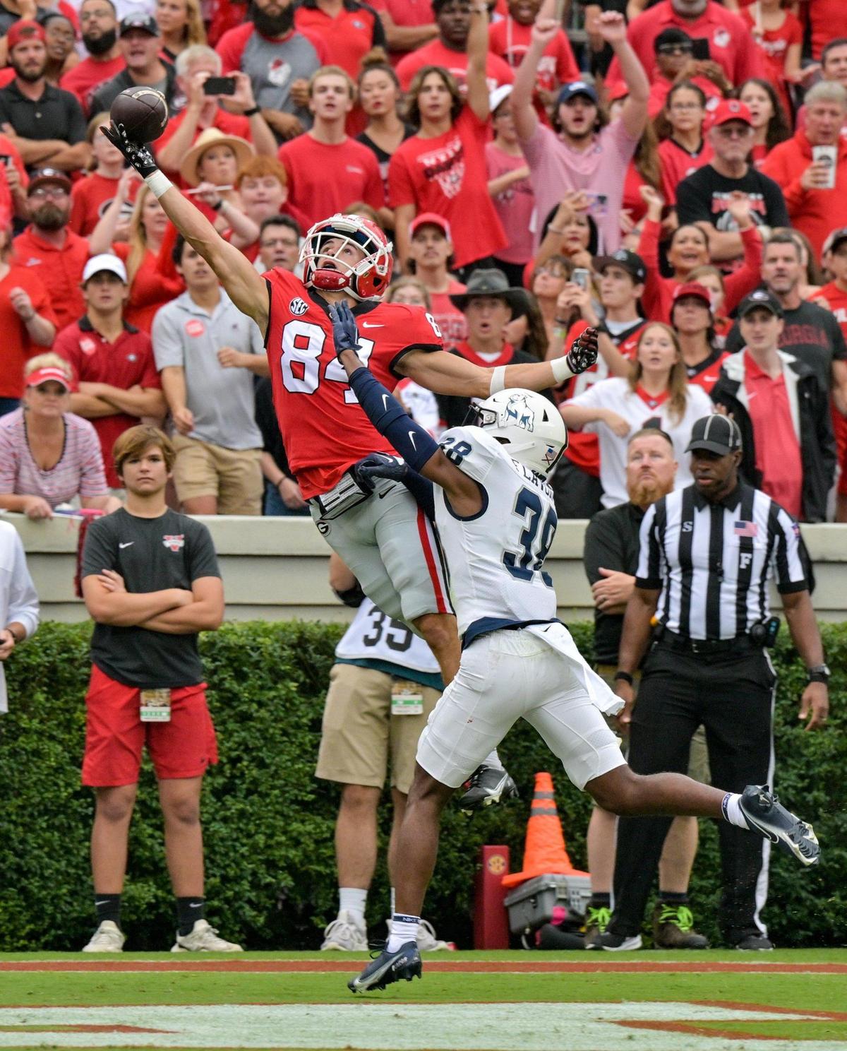 Georgia receiver Ladd McConkey (84) is unable to haul in a Stetson Bennett pass during the Bulldogs’ 33-0 win over Samford Saturday in Athens.