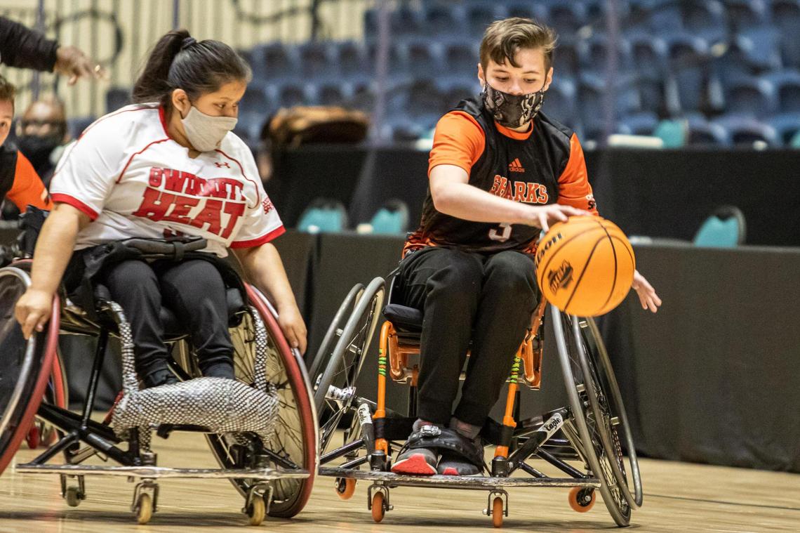Houston County’s Dalton Crosby (3) drives down the court against the Gwinnett Heat in the GHSA Championship.
