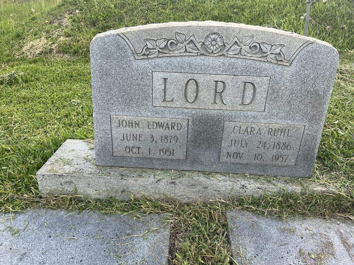 A head stone at Rose Hill cemetery is cleaned after Macon resident Phillip Dent read a Facebook post from Cliff Rozar expressing concern about the condition of his family’s plot in a Facebook post.