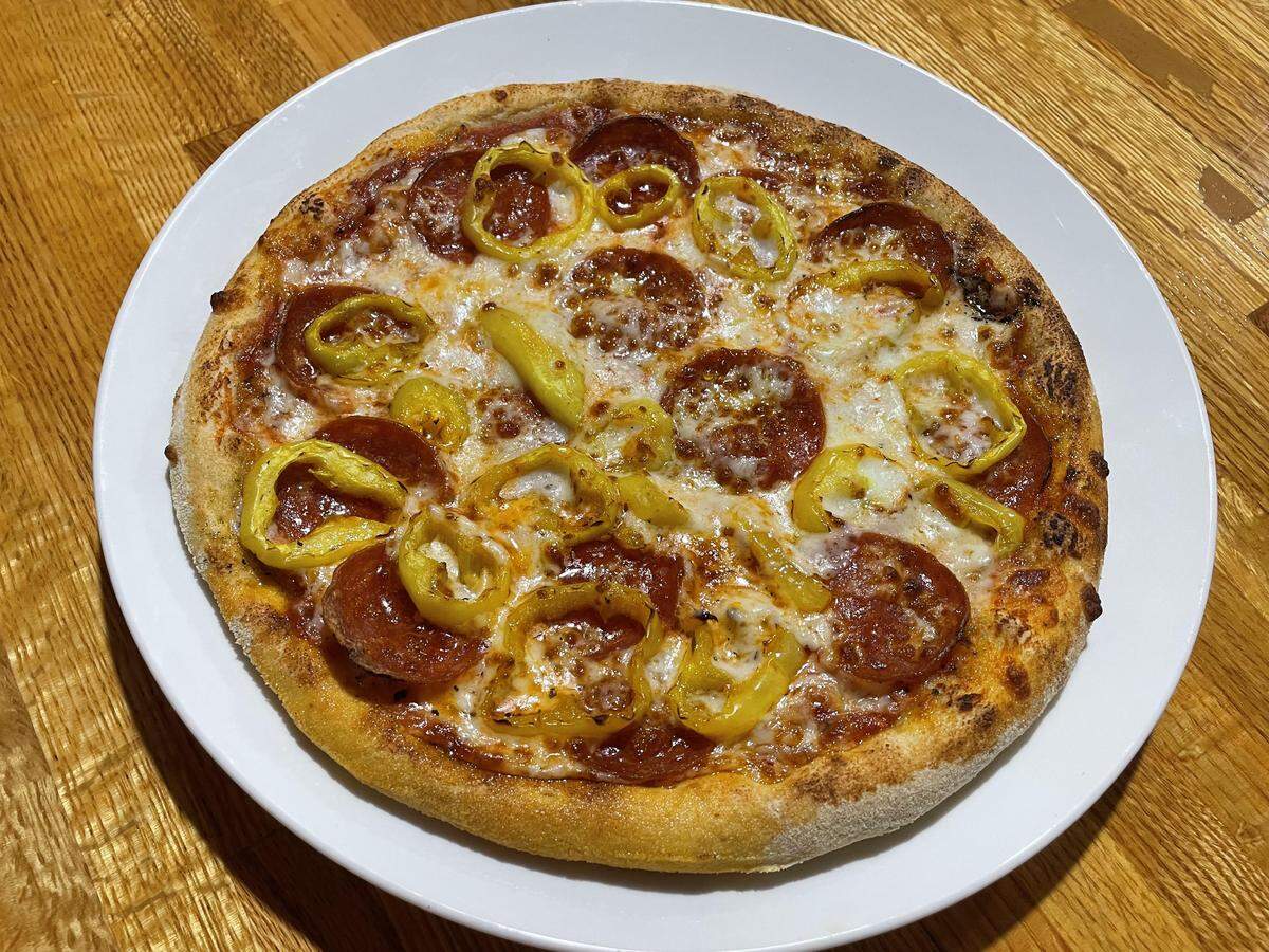A 10-inch CYO (create your own) pepperoni and banana pepper pizza at the new Aria Pizza in Warner Robins.