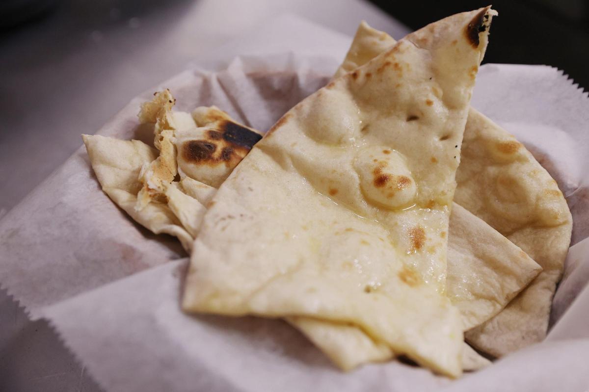Naan sits inside of a basket in the kitchen of Cook-in-Pot on Forsyth Street on Tuesday, Feb. 4, 2025, in downtown Macon, Georgia. The new restaurant offers a wide variety of authentic Indian, Mediterranean and Indo-Chinese dishes.