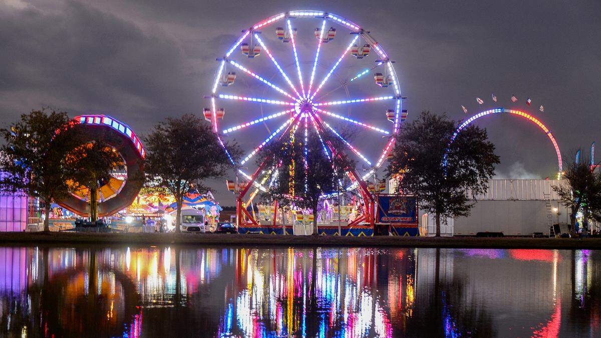 The Midway lights up the Georgia National Fairgrounds in Perry. The annual fair wraps up today.