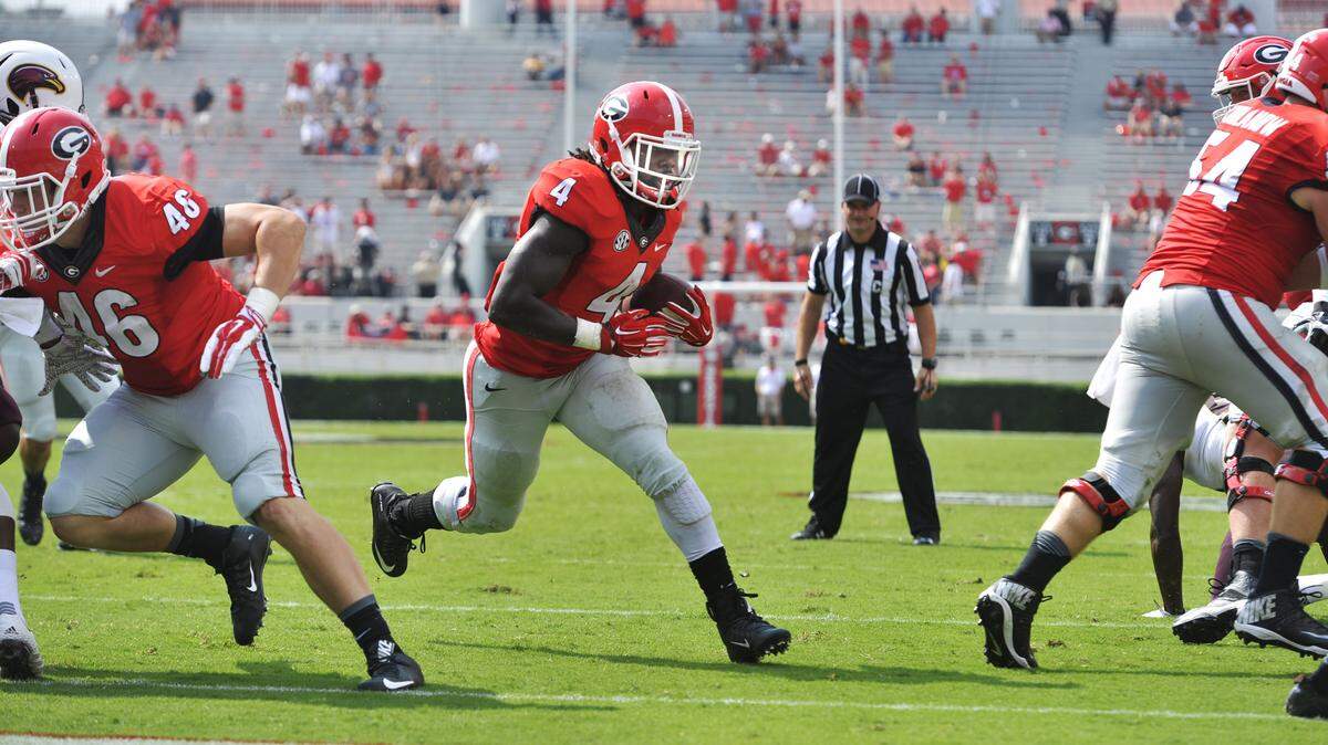 Georgia running back Keith Marshall breezes through the hole for a 2-yard touchdown run Saturday against Louisiana-Monroe.