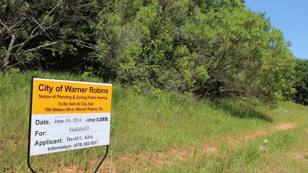 This sign on Arrie Road marks the tract where a Wal-Mart Neighborhood Market is planned in Houston County.