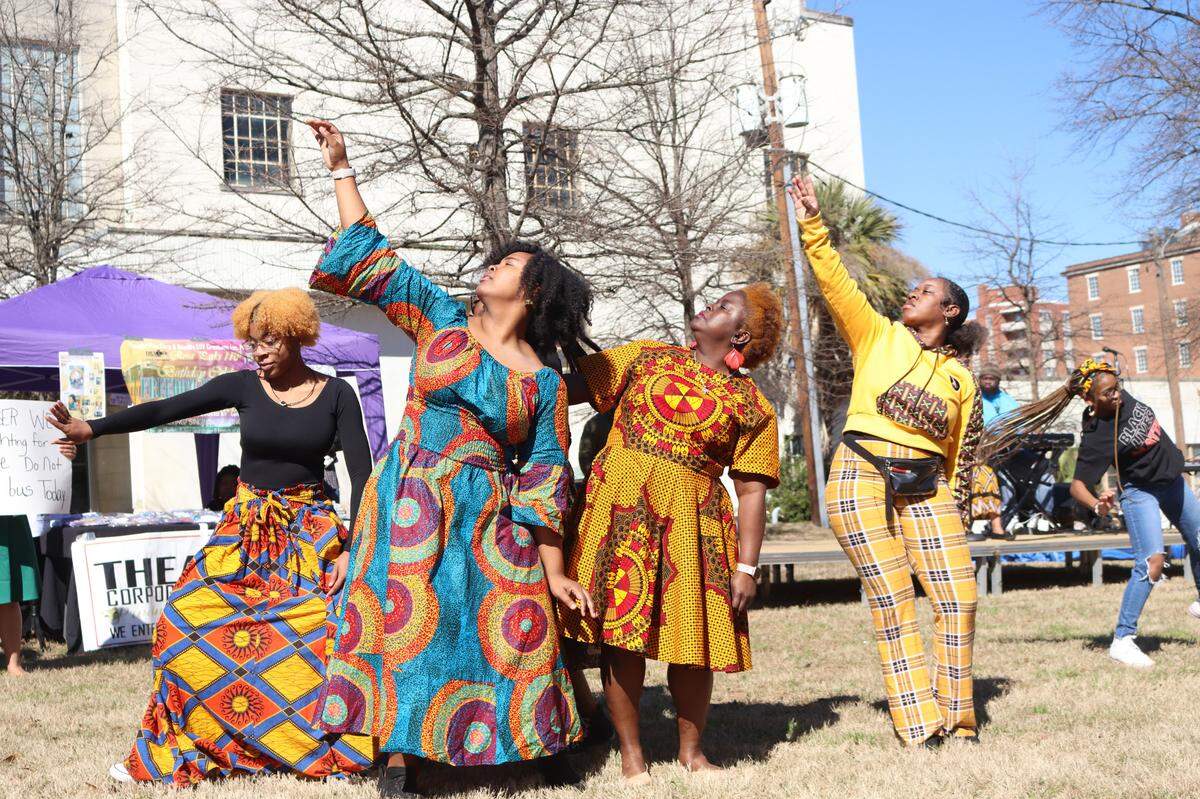 Members of the Hayiya Dance Theater perform during a play Saturday at Rosa Parks Square in downtown Macon at the “Freedom in the Park” event.. The play was a reenactment of Parks’ refusal to give up her bus seat and subsequent protests.