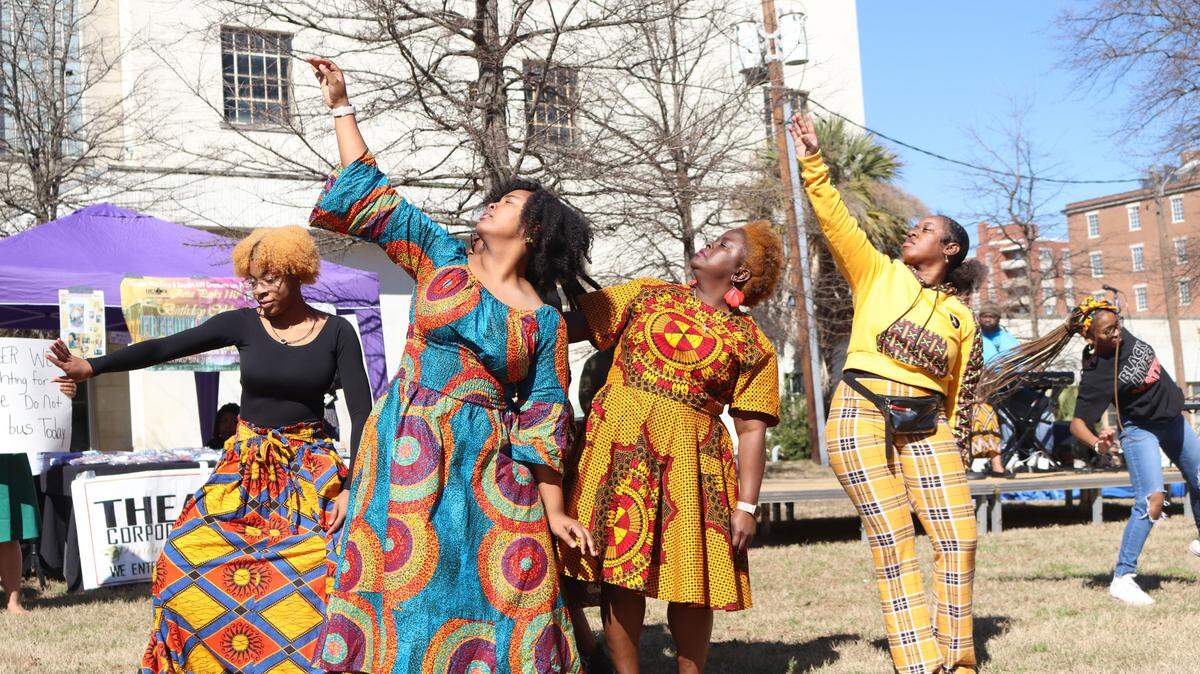 Members of the Hayiya Dance Theater perform during a play Saturday at Rosa Parks Square in downtown Macon at the “Freedom in the Park” event.. The play was a reenactment of Parks’ refusal to give up her bus seat and subsequent protests.