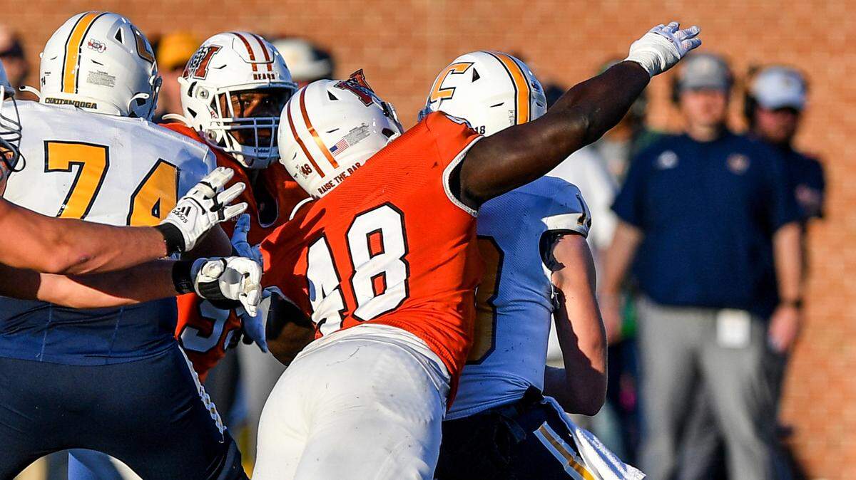 Mercer defensive lineman Solomon Zubairu sacks UTC quarterback Cole Copeland Saturday as the bears beat UTC 10-6.