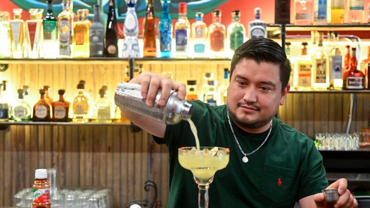 German Marin, co-owner of The Daisy Tequila and Margarita Bar at 158 Cherry St. in downtown Macon, makes one of their namesakes.