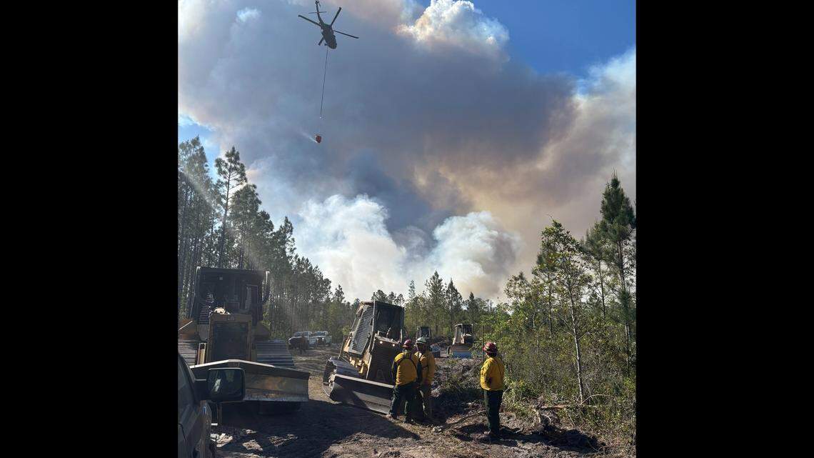Georgia Department of Natural Resources and Georgia Forestry Commission teams fight wildfires in South Georgia that scorched an estimated 34,000 acres.