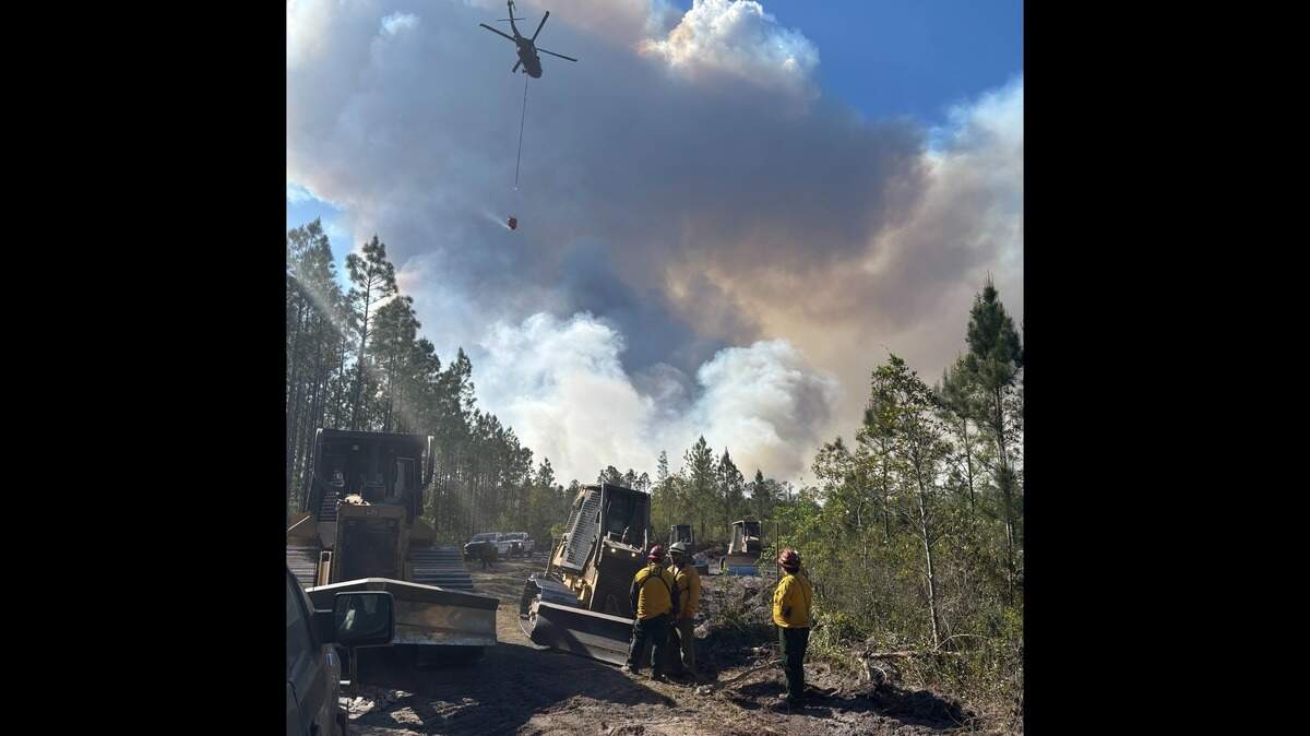 Georgia Department of Natural Resources and Georgia Forestry Commission teams fight wildfires in South Georgia that scorched an estimated 34,000 acres.