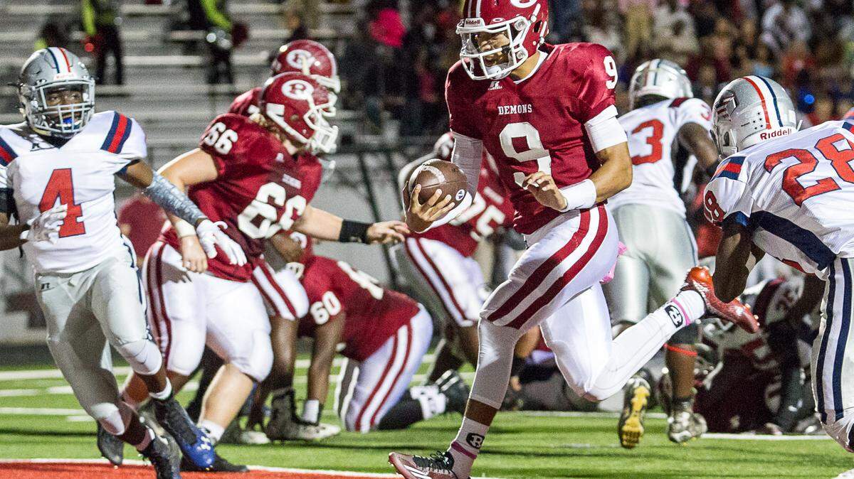 Warner Robins' Ivan Corbin scores during the first half of the Demons' game against Grovetown on Friday night.