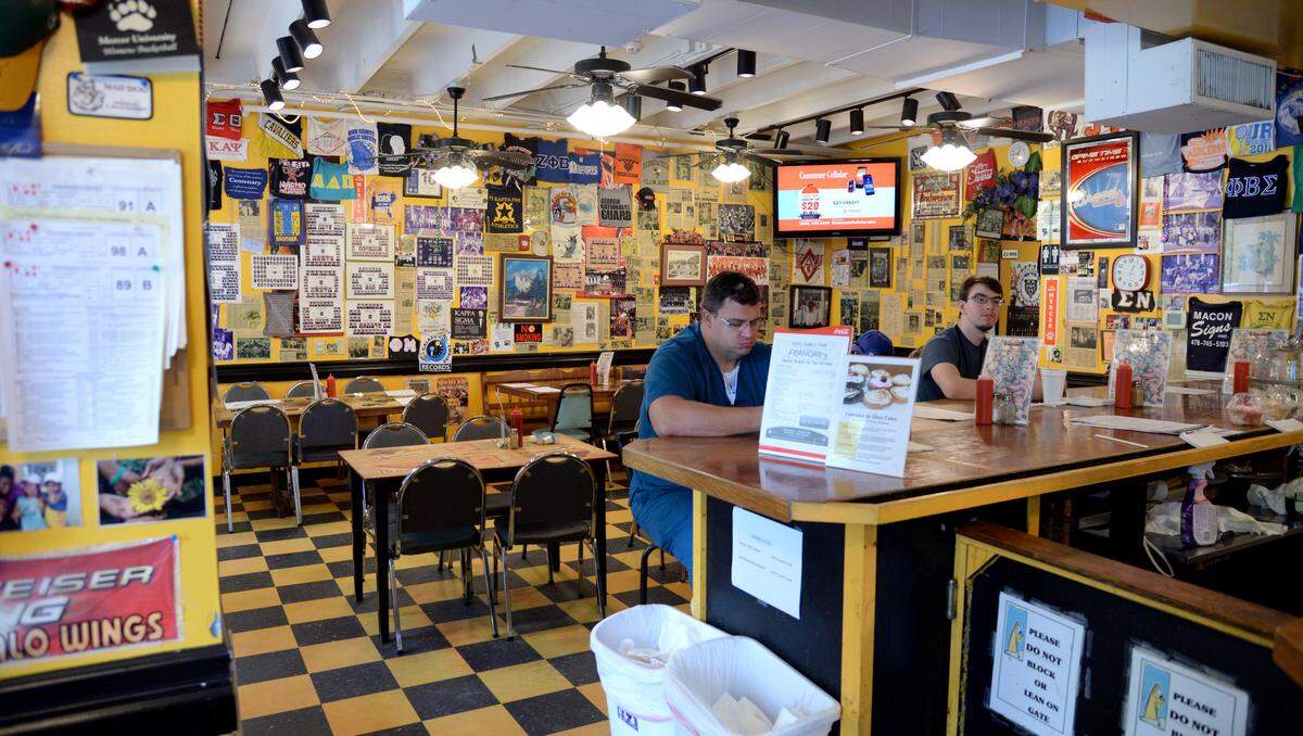 Francar’s Buffalo Wings’ walls are covered in memorabilia from Mercer University students and other customers.