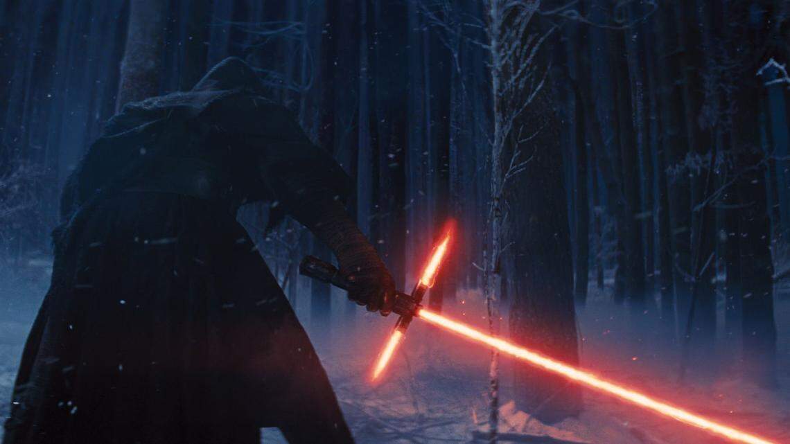 Adam Driver as Kylo Ren wields his lightsaber in a scene from "Star Wars: The Force Awakens." "Star Wars" has long been popular with Mormons, but it appears that their identification with the movies is only one manifestation of a deeper fascination with the genres of science fiction and fantasy.