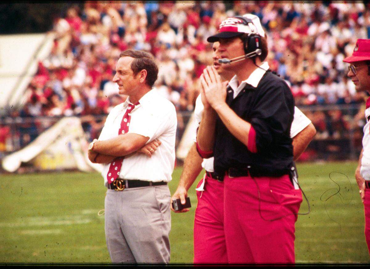 University of Georgia Bulldogs legend Vince Dooley (left) will be honored Saturday as UGA dedicates the field inside Sanford Stadium to his legacy. Dooley will be surrounded by family and past players.