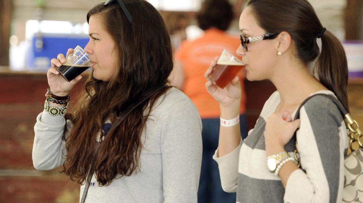 Festival-goers enjoy a beer during a previous year's Macon Octoberfest.